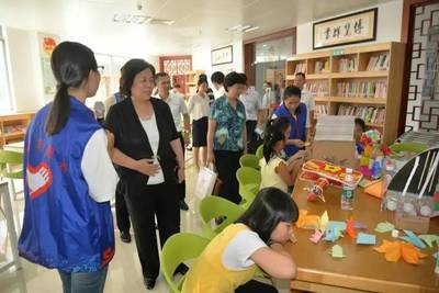 中國志愿服務聯合會到海口市新安社區調研指導志愿服務工作_教育_網